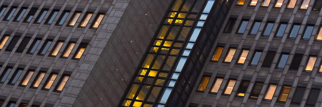 Building facade with illuminated windows